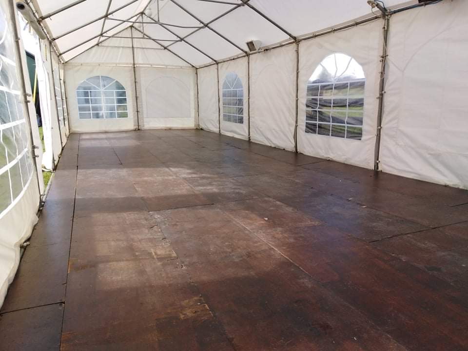 Image of marquee for hire with flooring, lights and heat