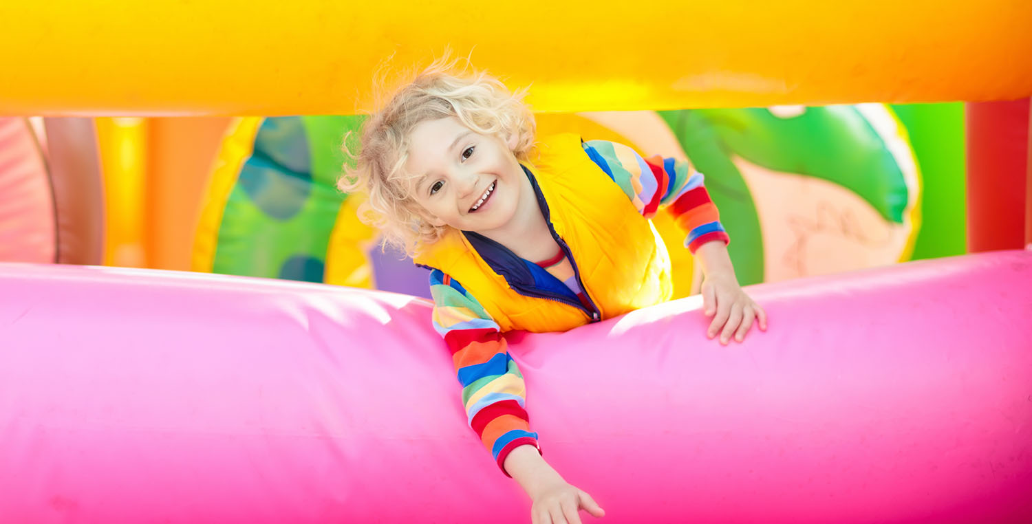 Happy child on bouncing castle - Carry On Bouncing